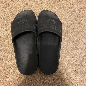 Black Gucci slides